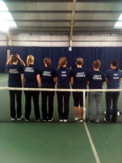 Kent Tennis players in line on an indoor court